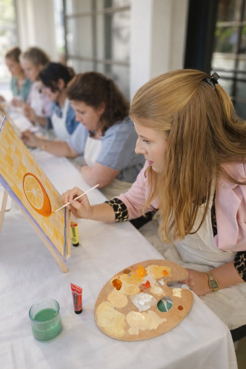 Sfeer tijdens een Sip & Paint workshop